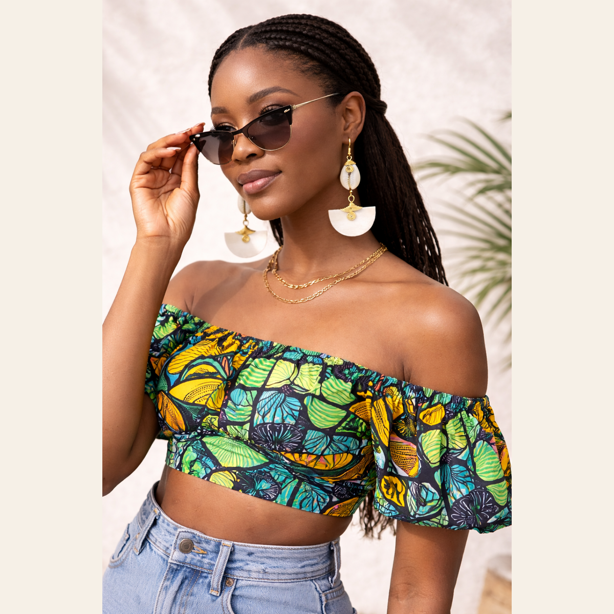 The Muriel’s cow horn drop earrings, handcrafted in Kenya