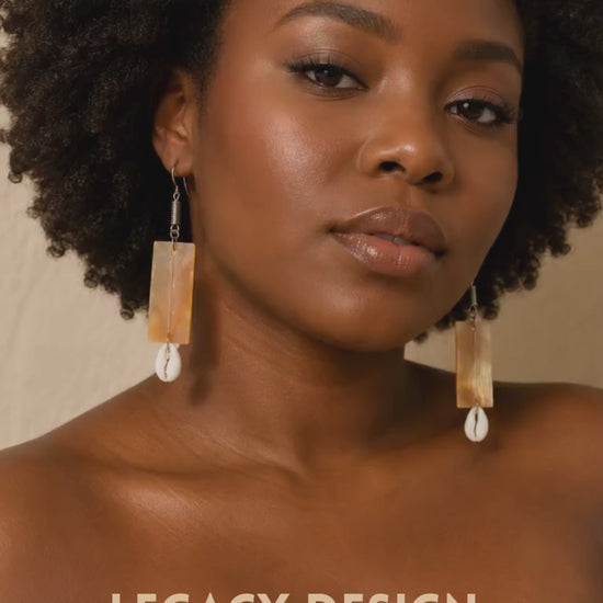 Video featuring the Cowrie Horn Drop Earrings by Legacy Design
