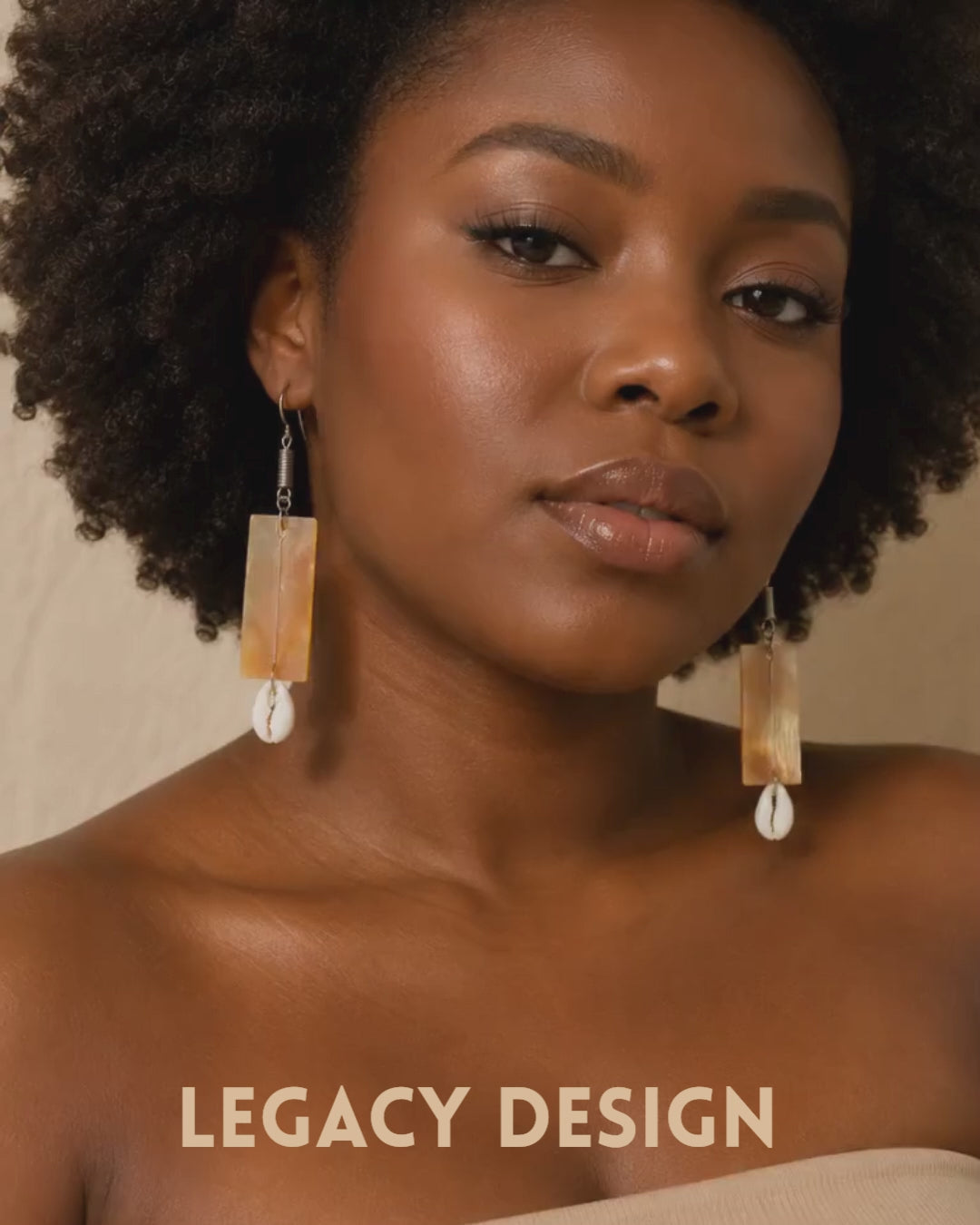 Video featuring the Cowrie Horn Drop Earrings by Legacy Design